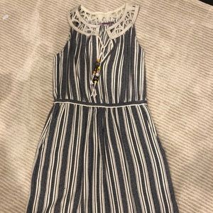 Cute calypso dress. Leather tassels. Size xs